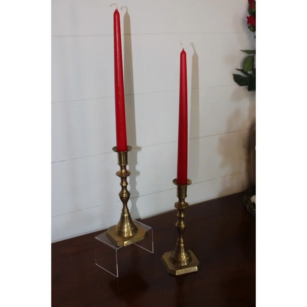 A Pair of 8  1/2 inch Antique Brass Candlesticks with turned stems